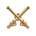 Insignia dourada AM/AT