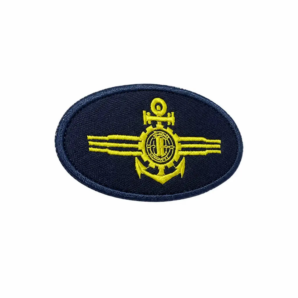 Patch oval azul marinho com âncora central, círculo com T e faixas amarelas