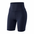 Bermuda azul marinho de treino, compressão, cintura alta e costuras discretas.