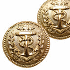 Dois emblemas circulares dourados com âncora, espada e folhas de louro.